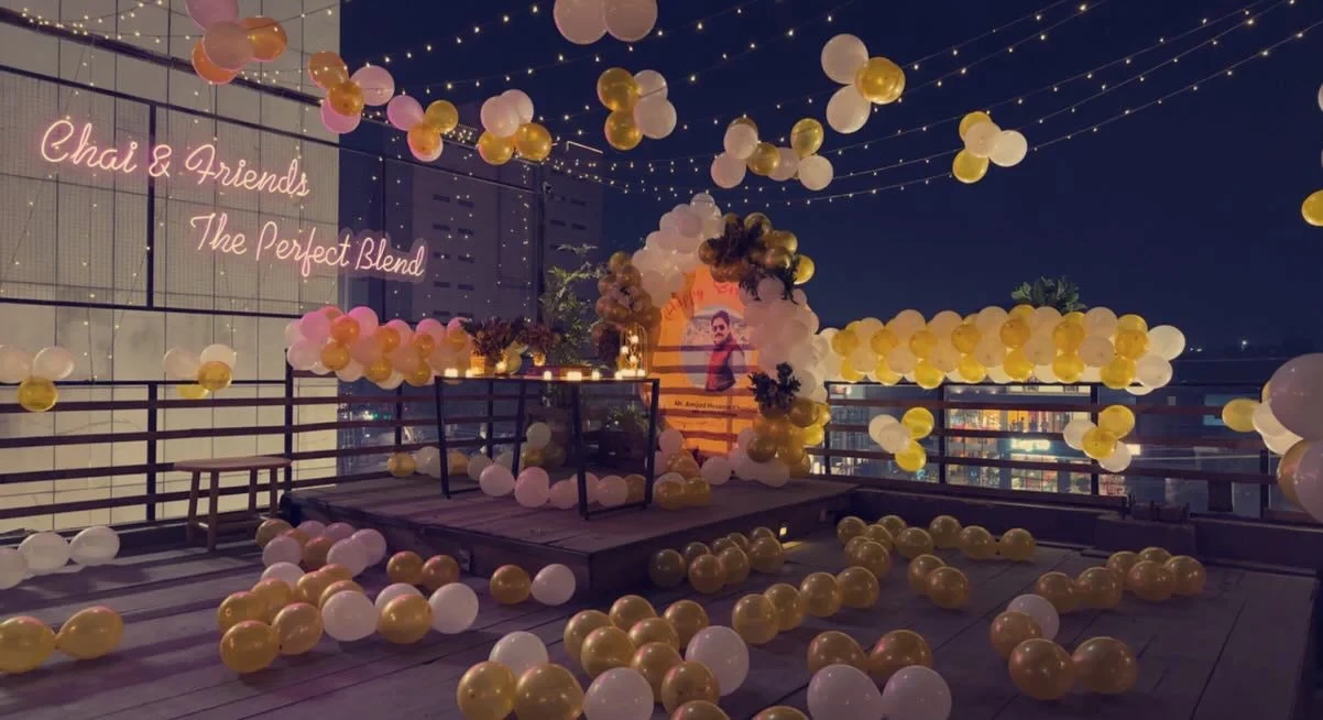 Rooftop decorated with balloons for a celebration