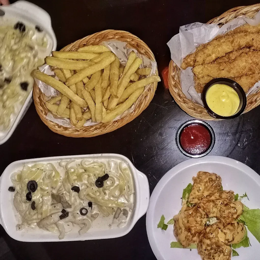 Fast food spread with fries and fish